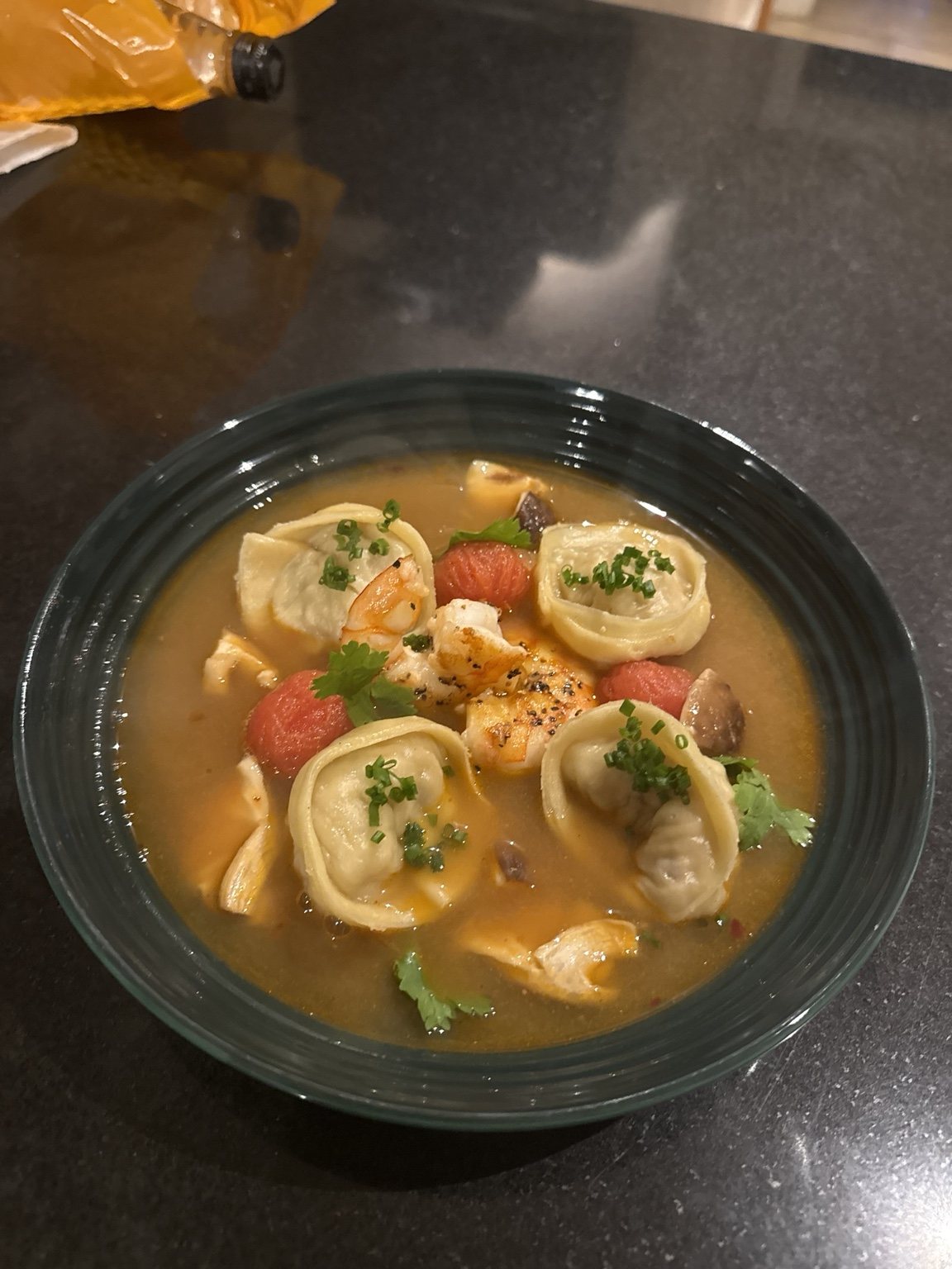 Dumplings in a rich broth prepared by Chef Ryan Padda
